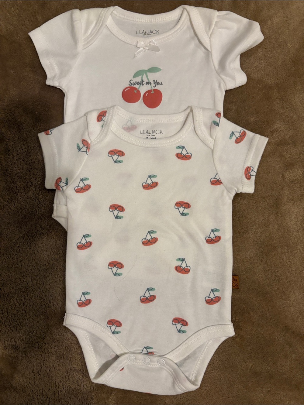 NWOT LILA & JACK Onesies (0-3 Mos.)